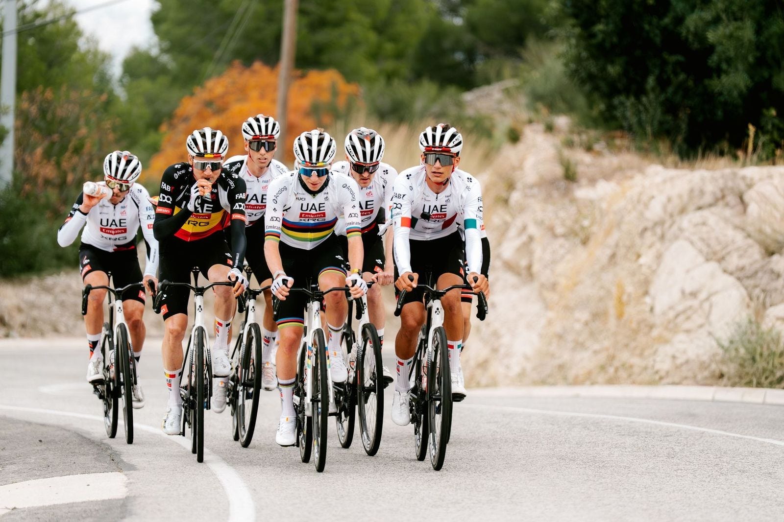 Two athletes. The main one holding C2:1 roducts 